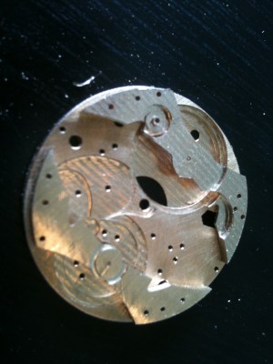 Mainplate with barrel and balance bridges